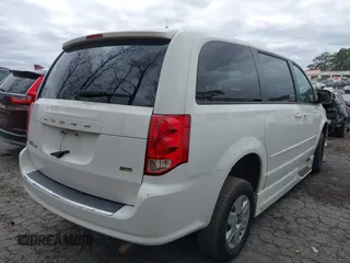 2012 Dodge Grand Caravan SE with VIN 2C4RDGBG9CR232038, listed as a IAAI auction lot 41823766 with 77,468 mi miles and . Bid and sale history available at DreamBid. Image 4.