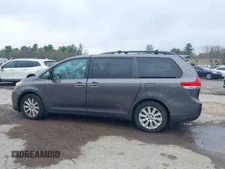 2012 Toyota Sienna XLE with VIN 5TDDK3DC2CS043855, listed as a IAAI auction lot 42189680 with 195,788 mi miles and . Bid and sale history available at DreamBid. Image 14.