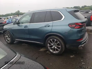 2024 BMW X5 xDrive40i with VIN 5UX23EU02R9T63818, listed as a Copart auction lot 60195525 with 26,773 mi miles and Salvage title. Bid and sale history available at DreamBid. Image 2.
