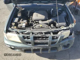 2004 Isuzu Rodeo S with VIN 4S2CK58W344303242, listed as a Copart auction lot 75339714 with 106,659 mi miles and Salvage title. Bid and sale history available at DreamBid. Image 14.