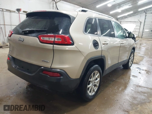 2014 Jeep Cherokee Latitude z VIN 1C4PJMCB0EW291782, wystawiony jako IAAI lot #42124092 z przebiegiem 170 265 mil mil oraz . Historia ofert i sprzedaży dostępna na DreamBid. Obrazek 4.
