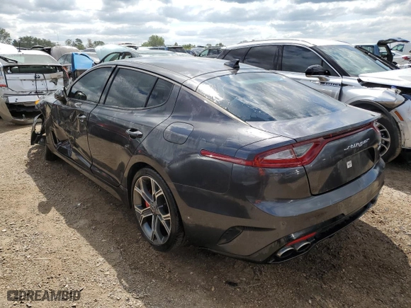 2021 Kia Stinger GT with VIN KNAE35LC2M6089778, listed as a Copart auction lot 67711054 with 76,690 mi miles and Salvage Title. Bid and sale history available at carsss.com. Image 2.