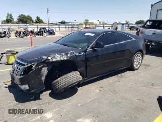 2012 Cadillac CTS Premium with VIN 1G6DS1E37C0107221, listed as a Copart auction lot 61735795 with 96,969 mi miles and Salvage title. Bid and sale history available at DreamBid. Image 1.