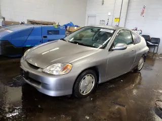 2000 Honda Insight z VIN JHMZE1371YT000122, wystawiony jako Copart lot #45698205 z przebiegiem 132 442 mil mil oraz Szkoda całkowita • Salvage title. Historia ofert i sprzedaży dostępna na DreamBid. Obrazek 1.