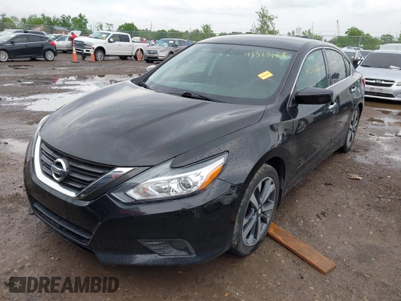 2016 Nissan Altima SR with VIN 1N4AL3AP2GC128229, listed as a IAAI auction lot 42317188 with 153,230 mi miles and . Bid and sale history available at DreamBid. Image 2.