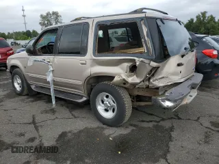 1997 Ford Explorer XLT with VIN 1FMDU35PXVZB69793, listed as a Copart auction lot 70712774 with 138,243 mi miles and Salvage title. Bid and sale history available at DreamBid. Image 2.