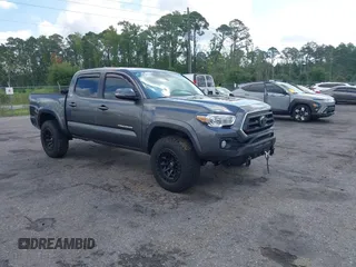 2022 Toyota Tacoma SR with VIN 3TMCZ5AN6NM465106, listed as a IAAI auction lot 42624781 with 48,084 mi miles and . Bid and sale history available at DreamBid. Image 1.