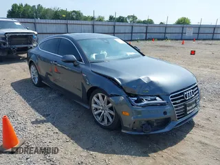 2014 Audi A7 Prestige with VIN WAU2GAFC6EN147684, listed as a IAAI auction lot 39757368 with 100,511 mi miles and . Bid and sale history available at DreamBid. Image 1.