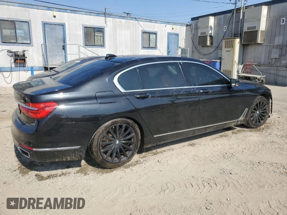2016 BMW 7 Series 740i z VIN WBA7E2C58GG738940, wystawiony jako Copart lot #60503595 z przebiegiem 99 654 mil mil oraz Szkoda całkowita • Salvage title. Historia ofert i sprzedaży dostępna na DreamBid. Obrazek 3.