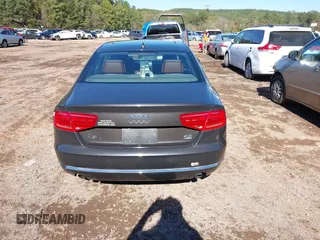 2011 Audi A8 with VIN WAURVAFDXBN014290, listed as a IAAI auction lot 40860777 with 152,584 mi miles and . Bid and sale history available at DreamBid. Image 16.
