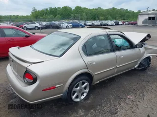 2000 Nissan Maxima GXE z VIN JN1CA31D2YT531324, wystawiony jako IAAI lot #42126970 z przebiegiem 141 864 mil mil oraz . Historia ofert i sprzedaży dostępna na DreamBid. Obrazek 4.