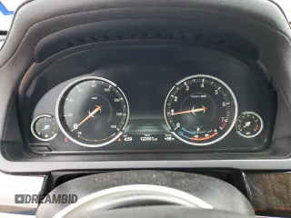 2015 BMW 7 Series 740Li with VIN WBAYE4C52FD947008, listed as a Copart auction lot 45206035 with 123,551 mi miles and Salvage Title. Bid and sale history available at DreamBid. Image 9.