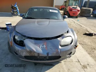 2006 Mazda MX-5 Miata Sport z VIN JM1NC25F260115830, wystawiony jako Copart lot #76844774 z przebiegiem 52 599 mil mil oraz Szkoda całkowita • Salvage title. Historia ofert i sprzedaży dostępna na DreamBid. Obrazek 5.