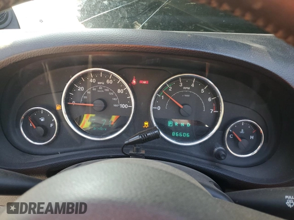 2012 Jeep Wrangler Unlimited Sahara with VIN 1C4BJWEG5CL235835, listed as a Copart auction lot 60673555 with 86,606 mi miles and Salvage title. Bid and sale history available at DreamBid. Image 9.