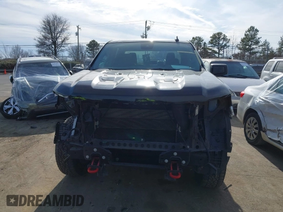 2022 Chevrolet Silverado 1500 Custom Trail Boss with VIN 3GCPDCED5NG547087, listed as a IAAI auction lot 41217879 with 164,539 mi miles and . Bid and sale history available at DreamBid. Image 13.
