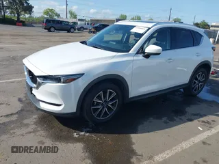 2017 Mazda CX-5 Grand Touring with VIN JM3KFADLXH0222341, listed as a IAAI auction lot 41990464 with 94,374 mi miles and . Bid and sale history available at carsss.com. Image 20.
