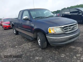 2002 Ford F-150 XL with VIN 1FTRX17202NA66022, listed as a IAAI auction lot 42382320 with 87,916 mi miles and . Bid and sale history available at DreamBid. Image 1.