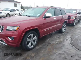 2014 Jeep Grand Cherokee Overland with VIN 1C4RJFCG9EC299235, listed as a IAAI auction lot 41670065 with 108,589 mi miles and . Bid and sale history available at DreamBid. Image 6.