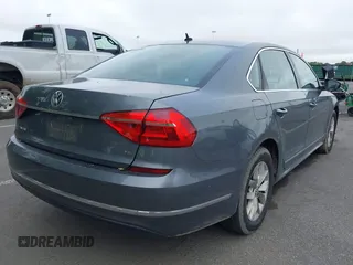 2016 Volkswagen Passat S with VIN 1VWAT7A30GC054210, listed as a IAAI auction lot 42452304 with 119,842 mi miles and . Bid and sale history available at DreamBid. Image 4.