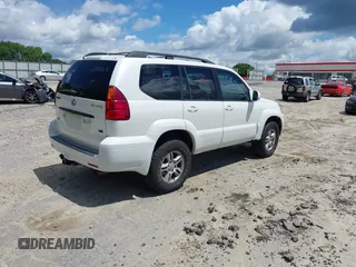 2005 Lexus GX 470 z VIN JTJBT20X350075577, wystawiony jako IAAI lot #42534615 z przebiegiem 233 329 mil mil oraz . Historia ofert i sprzedaży dostępna na DreamBid. Obrazek 4.