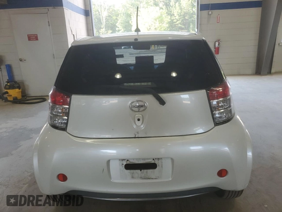 2013 Scion iQ with VIN JTNJJXB00DJ022387, listed as a Copart auction lot 61837745 with 151,944 mi miles and Salvage title. Bid and sale history available at DreamBid. Image 6.