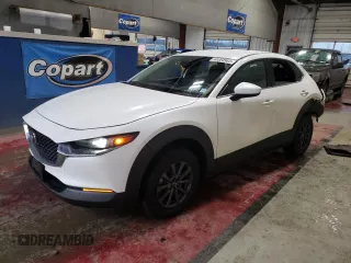 2024 Mazda CX-30 S with VIN 3MVDMBAM2RM695433, listed as a Copart auction lot 46304985 with 7,034 mi miles and Salvage Title. Bid and sale history available at carsss.com. Image 1.