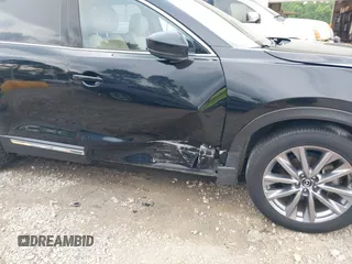 2022 Mazda CX-9 Grand Touring with VIN JM3TCBDYXN0627657, listed as a IAAI auction lot 42498856 with 61,044 mi miles and . Bid and sale history available at DreamBid. Image 6.