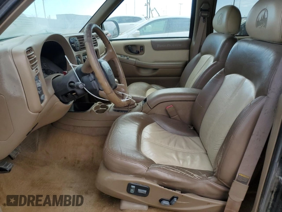 1999 Chevrolet Blazer Trailblazer z VIN 1GNDT13W2X2130625, wystawiony jako Copart lot #50596885 z przebiegiem 187 444 mil mil oraz Czysty tytuł • Clean title. Historia ofert i sprzedaży dostępna na DreamBid. Obrazek 7.