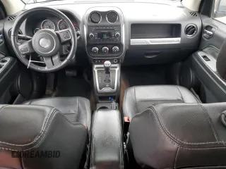 2014 Jeep Compass Latitude with VIN 1C4NJDEB4ED601769, listed as a Copart auction lot 48901365 with 129,826 mi miles and Salvage Title. Bid and sale history available at carsss.com. Image 8.