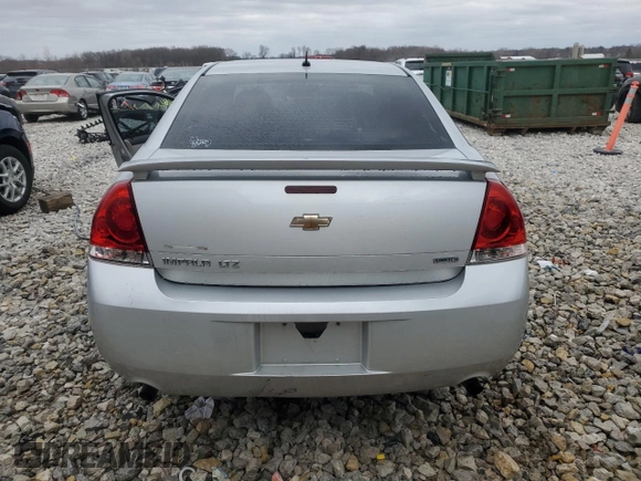 2014 Chevrolet Impala LTZ with VIN 2G1WC5E33E1166602, listed as a Copart auction lot 52108575 with 124,477 mi miles and Clean Title. Bid and sale history available at DreamBid. Image 6.