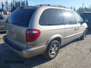 2002 Dodge Grand Caravan with VIN 2B8GT54L82R541812, listed as a IAAI auction lot 42028066 with 207,472 mi miles and . Bid and sale history available at DreamBid. Image 4.