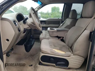 2004 Ford F-150 STX with VIN 1FTRX14W44NC37543, listed as a Copart auction lot 57442095 with 201,071 mi miles and Salvage title. Bid and sale history available at DreamBid. Image 7.