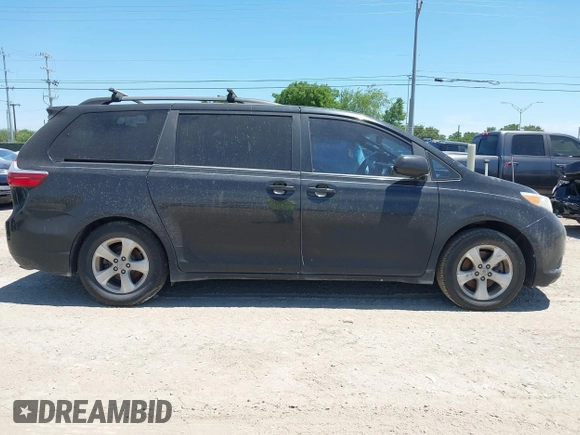 2015 Toyota Sienna LE AAS with VIN 5TDKK3DC7FS687525, listed as a IAAI auction lot 42250458 with 140,429 mi miles and . Bid and sale history available at DreamBid. Image 13.
