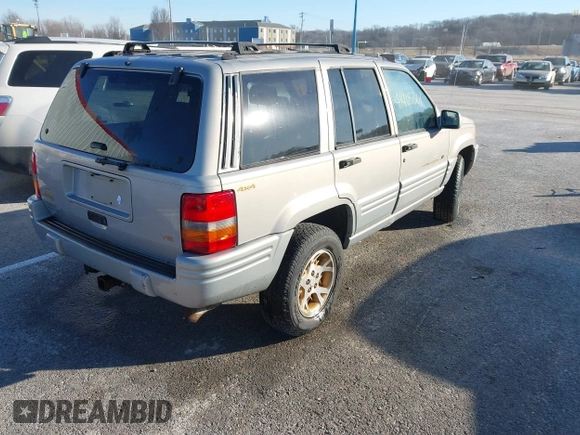 1997 Jeep Grand Cherokee Limited with VIN 1J4GZ78Y8VC718435, listed as a IAAI auction lot 41405361 with 210,599 mi miles. Bid and sale history available at carsss.com. Image 4.