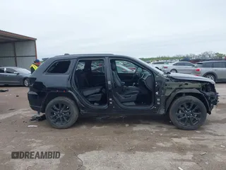 2018 Jeep Grand Cherokee Laredo E with VIN 1C4RJFAG5JC280033, listed as a IAAI auction lot 41953744 with 69,269 mi miles and . Bid and sale history available at DreamBid. Image 14.