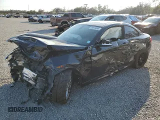 2015 BMW 2 Series M235i with VIN WBA1J7C56FV358181, listed as a Copart auction lot 89079445 with 0 mi miles and Salvage Title. Bid and sale history available at carsss.com. Image 2.