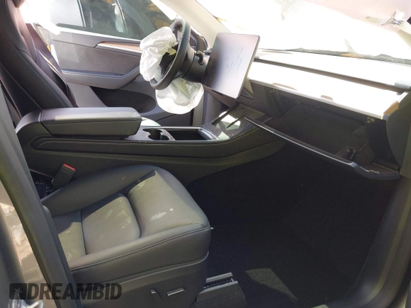 2024 Tesla Model Y Long Range with VIN 7SAYGDEE2RA311261, listed as a IAAI auction lot 41534010 with Not Provided miles and . Bid and sale history available at DreamBid. Image 5.
