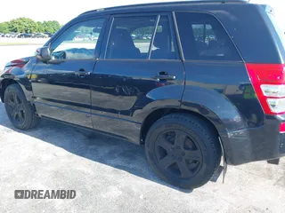 2006 Suzuki Grand Vitara Luxury z VIN JS3TD947664104590, wystawiony jako IAAI lot #42798282 z przebiegiem 146 725 mil mil oraz . Historia ofert i sprzedaży dostępna na DreamBid. Obrazek 6.