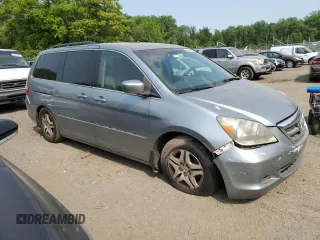 2006 Honda Odyssey EX z VIN 5FNRL38416B122268, wystawiony jako Copart lot #58969785 z przebiegiem 167 991 mil mil oraz Szkoda całkowita • Salvage title. Historia ofert i sprzedaży dostępna na DreamBid. Obrazek 4.