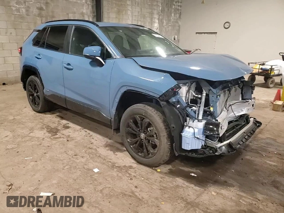 2024 Toyota RAV4 Hybrid SE with VIN 2T3T6RFVXRW064008, listed as a Copart auction lot 55734465 with 13,655 mi miles and Salvage title. Bid and sale history available at DreamBid. Image 15.