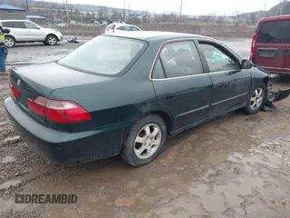 2000 Honda Accord SE z VIN 1HGCG5672YA083142, wystawiony jako IAAI lot #41499986 z przebiegiem Nie podano mil oraz . Historia ofert i sprzedaży dostępna na DreamBid. Obrazek 4.
