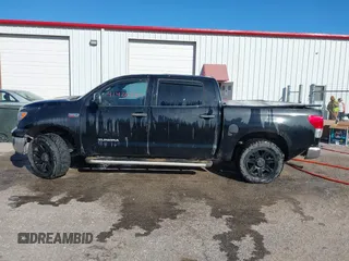 2011 Toyota Tundra z VIN 5TFEY5F12BX115107, wystawiony jako IAAI lot #41426224 z przebiegiem 143 487 mil mil oraz . Historia ofert i sprzedaży dostępna na DreamBid. Obrazek 14.