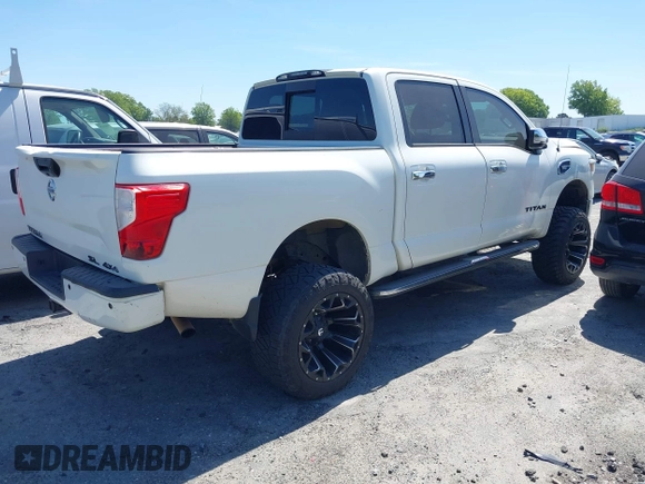 2017 Nissan Titan SL z VIN 1N6AA1E51HN503222, wystawiony jako IAAI lot #41908062 z przebiegiem 121 334 mil mil oraz . Historia ofert i sprzedaży dostępna na DreamBid. Obrazek 4.