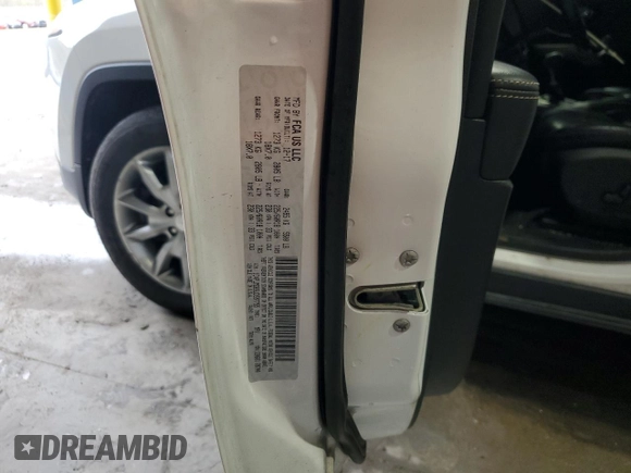 2018 Jeep Cherokee Limited z VIN 1C4PJMDB9JD597755, wystawiony jako Copart lot #51823585 z przebiegiem 67 085 mil mil oraz Szkoda całkowita • Salvage title. Historia ofert i sprzedaży dostępna na DreamBid. Obrazek 13.