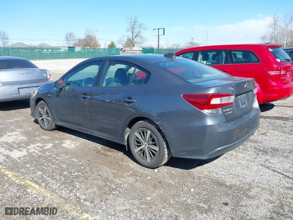 2021 Subaru Impreza Premium with VIN 4S3GKAD60M3604973, listed as a IAAI auction lot 41665953 with 101,575 mi miles. Bid and sale history available at carsss.com. Image 3.