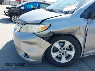 2014 Toyota Sienna LE AAS with VIN 5TDKK3DC4ES447265, listed as a IAAI auction lot 42024631 with 112,890 mi miles and . Bid and sale history available at carsss.com. Image 6.