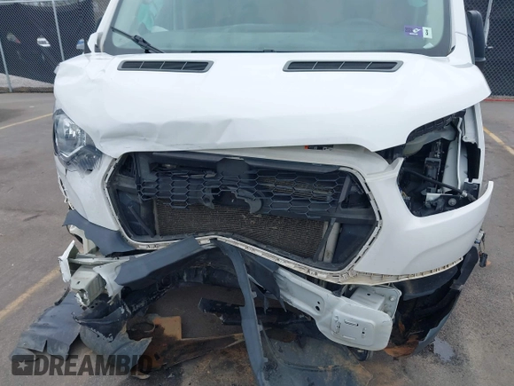 2021 Ford Transit Cargo with VIN 1FTBR1C85MKA12810, listed as a IAAI auction lot 41610132 with 105,724 mi miles and . Bid and sale history available at DreamBid. Image 6.