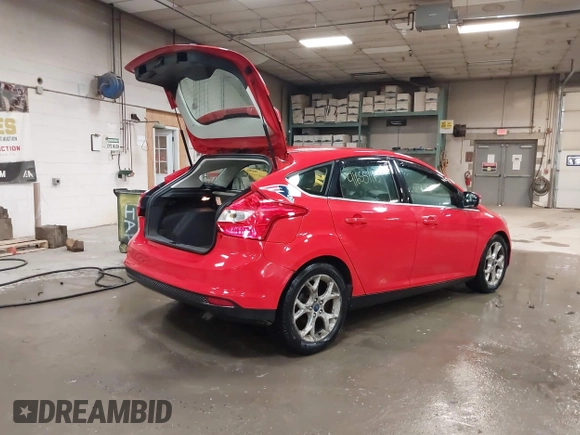2012 Ford Focus SEL with VIN 1FAHP3M23CL460290, listed as a IAAI auction lot 41655711 with 137,743 mi miles. Bid and sale history available at carsss.com. Image 4.