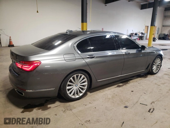 2018 BMW 7 Series 740i xDrive with VIN WBA7E4C5XJGV24275, listed as a Copart auction lot 48987063 with 48,864 mi miles. Bid and sale history available at carsss.com. Image 3.