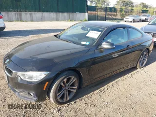 2014 BMW 4 Series 428i xDrive with VIN WBA3N9C55EF721295, listed as a IAAI auction lot 42139256 with 85,472 mi miles and . Bid and sale history available at carsss.com. Image 14.